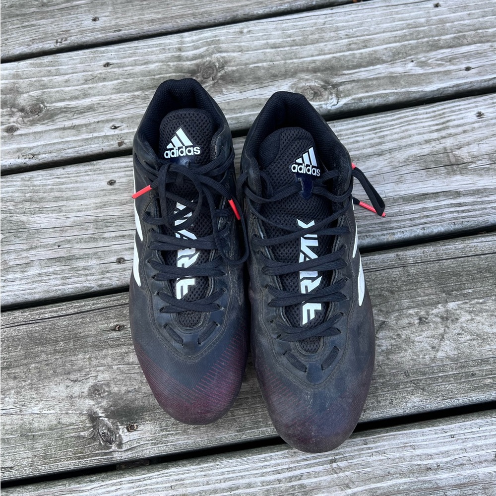 Adidas men’s size 9 football cleats.